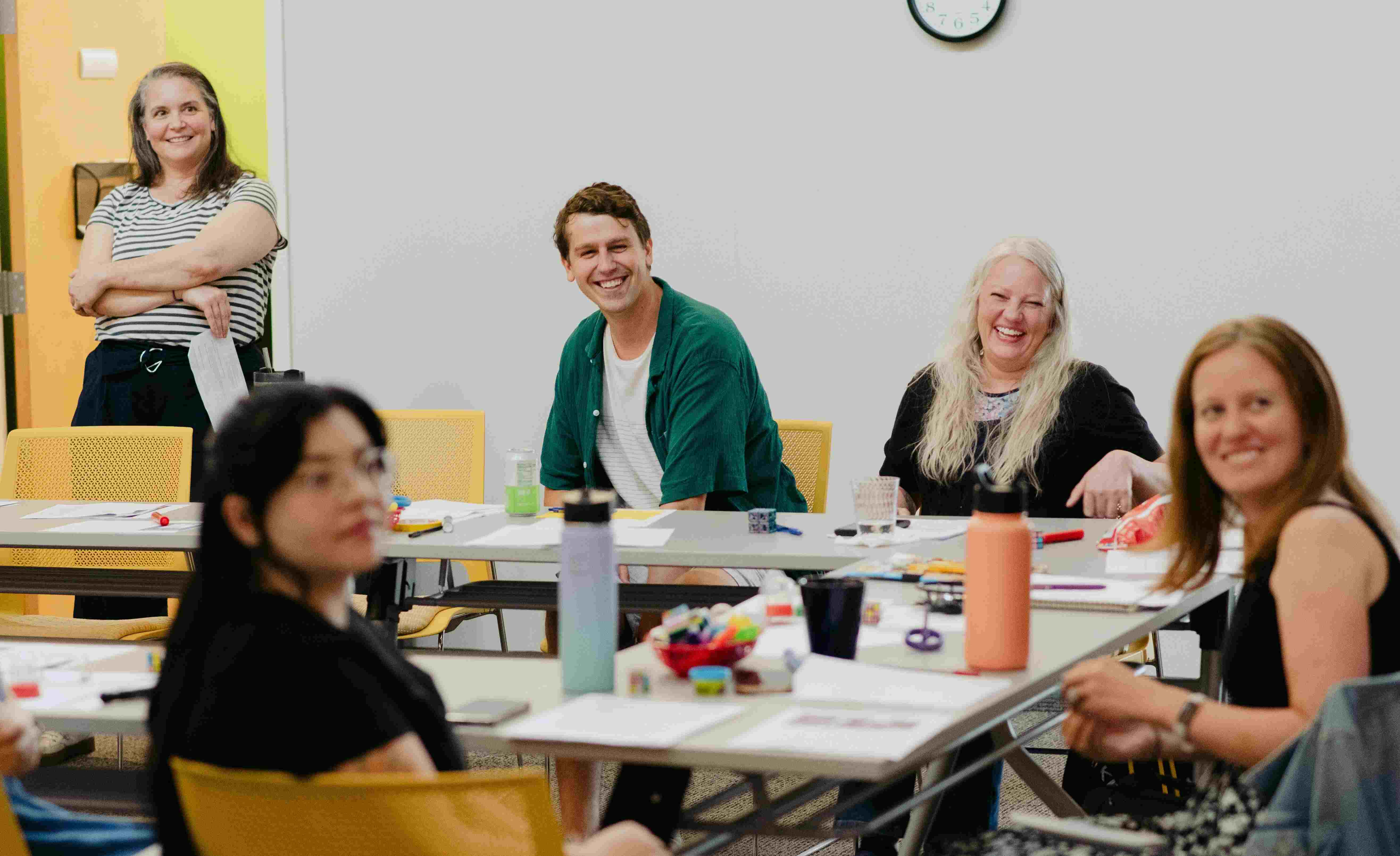 The Improve Group in a meeting room